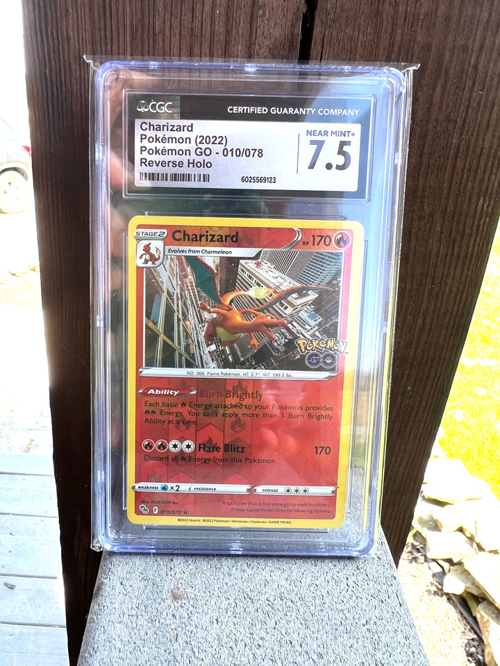 Charizard Pokémon Go 010/078 Reverse Holo CGC Near Mint + 7.5
